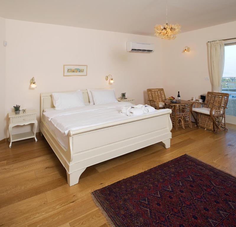 Hotel Jasmine Mansion Roš Pina Pokoj fotografie